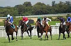 Court Masterpiece and Jimmy Fortune burst through a dream gap on the rails to win the Sussex Stakes in great style, from Soviet Song (Johnny Murtagh black cap), Rob Roy (Ryan Moore red) and Arafa (Alan Munro) at Glorious Goodwood (02-08-06)