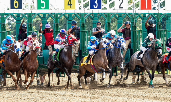 Men In Jockey Uniform Riding Horses At The Kentucky Derby